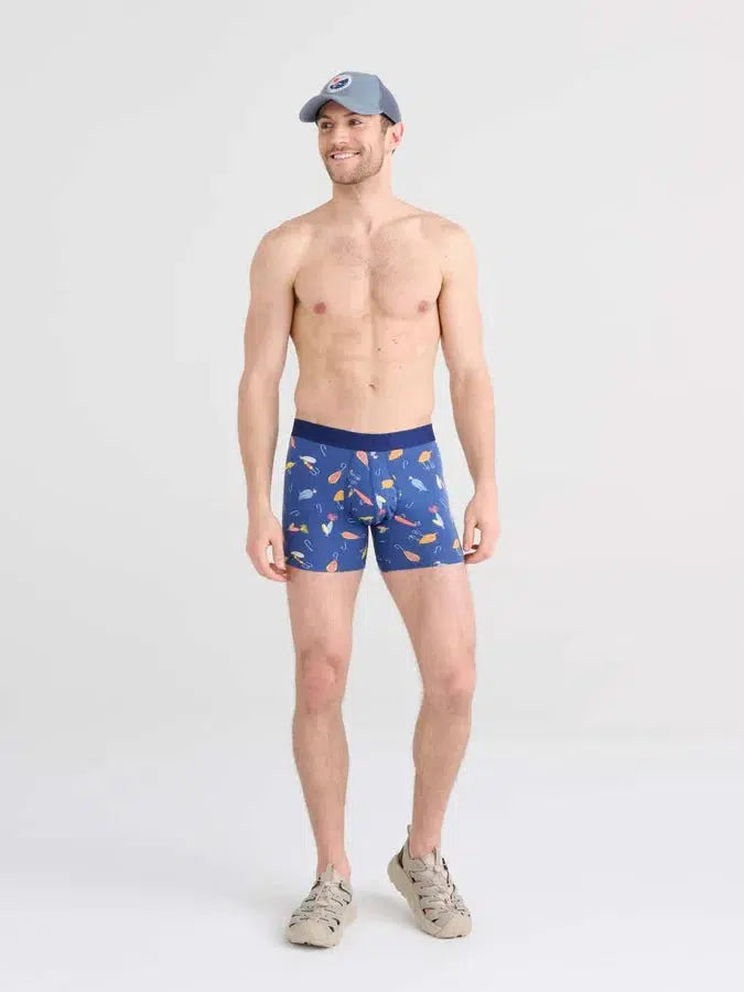 SAXX DropTemp Cooling Cotton Boxer Brief in Lures Blueberry — front view on model