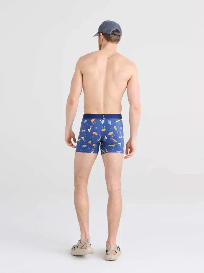 SAXX DropTemp Cooling Cotton Boxer Brief in Lures Blueberry — back view on model