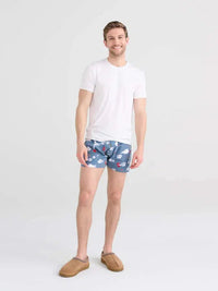 SAXX DropTemp Cooling Sleep Boxer in Smokin' In Bed Stone Blue — front view on model