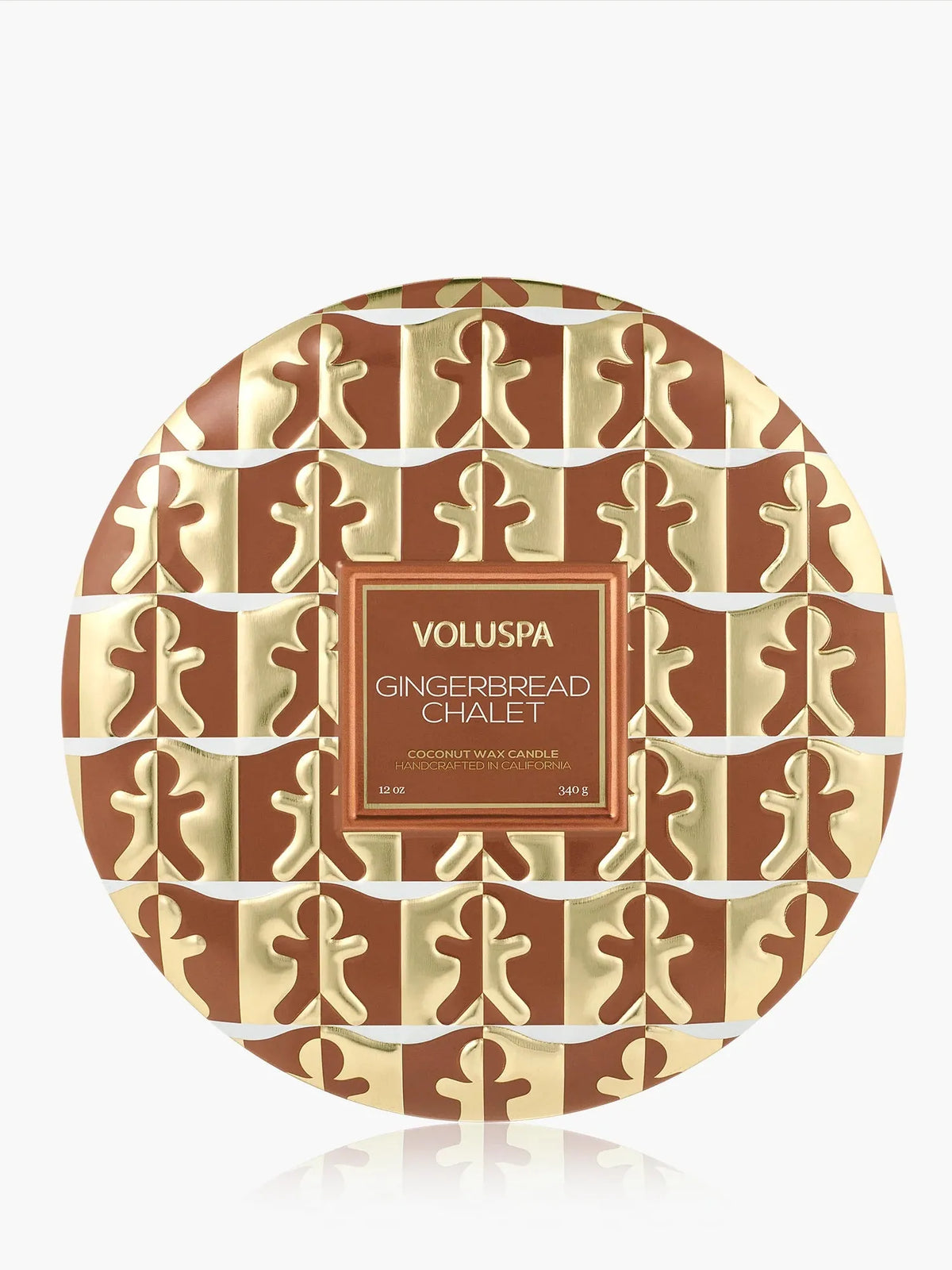 Voluspa Gingerbread Chalet 3-Wick Tin Candle, brown and cream patterned lid viewed from above
