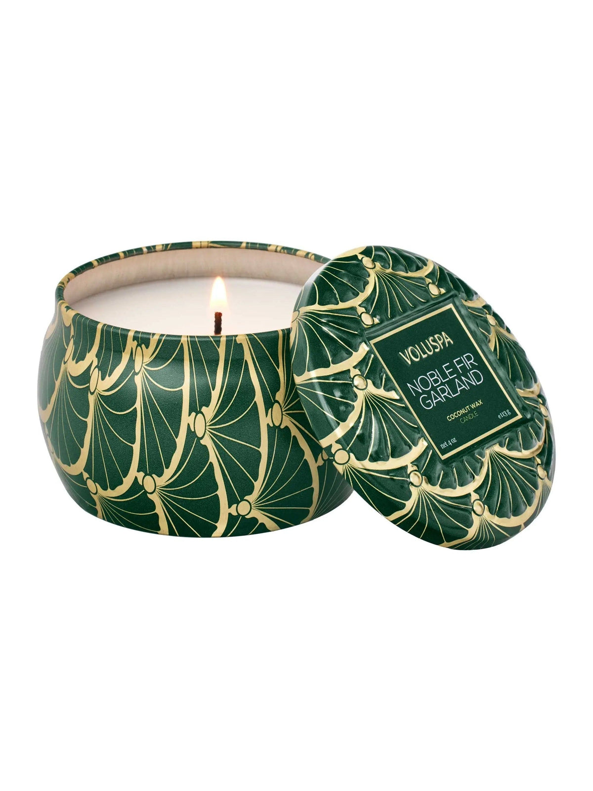 Voluspa Noble Fir Garland Mini Tin Candle, lit candle in a green and gold tin with the lid beside it
